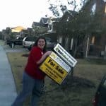 Angie Removing Sign Moving in and removing the HUD agent's sign